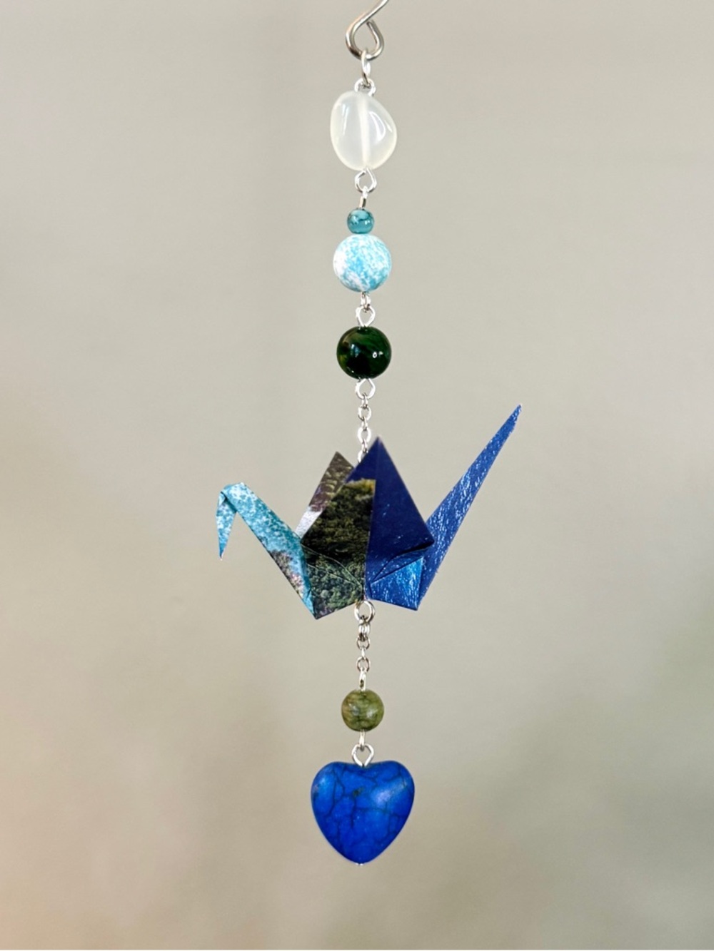 Origami Ornament #2481 - Small Crane with Blue Stone Heart Bead